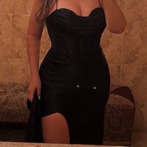 Black Long sleek formal gown with a corset bodice.